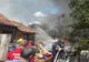 O casă a luat foc de la o căpiță de  fân