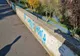 Grafitti cu mesaje obscene pe garduri din Arad. Autorii: patru copii